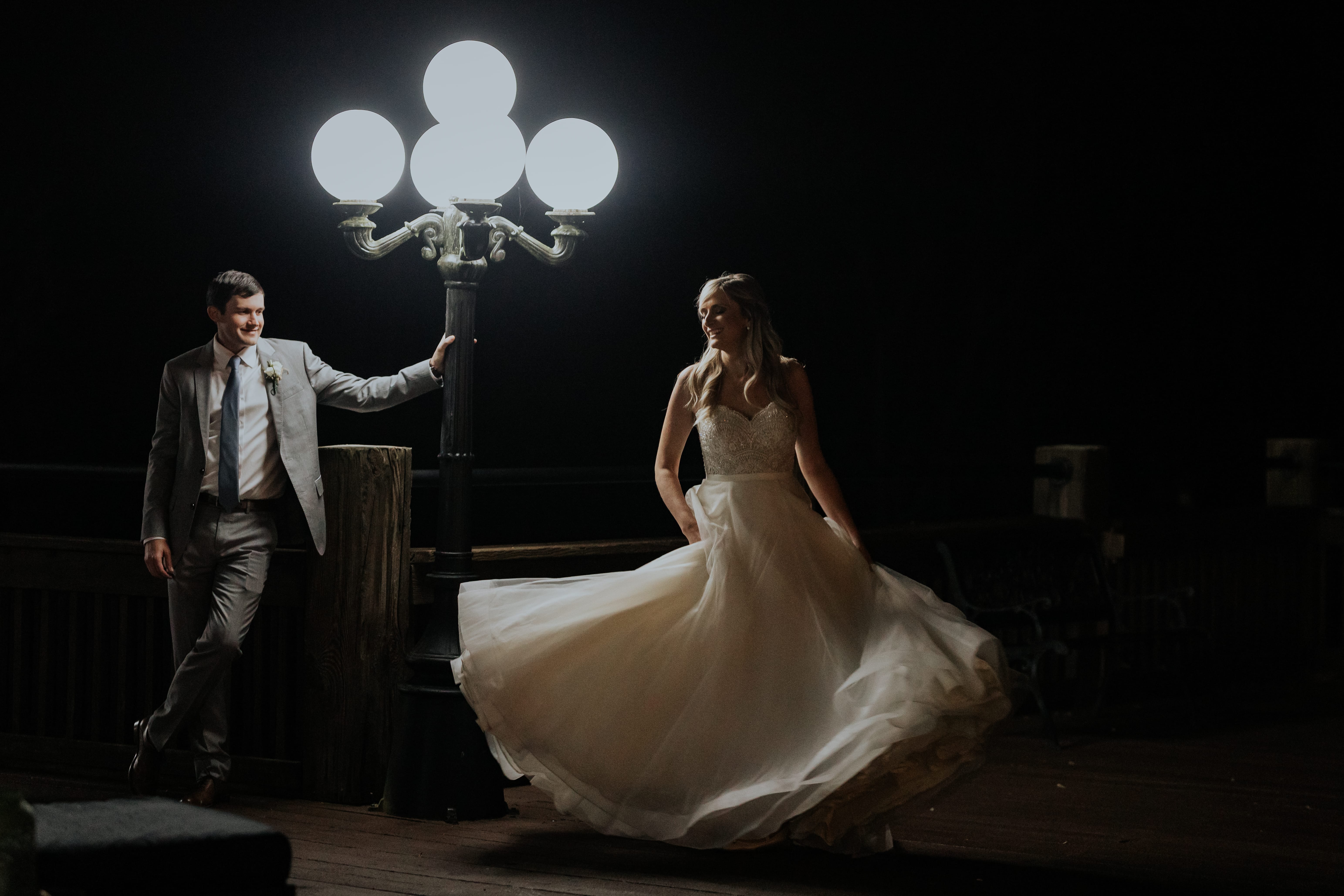 Atlanta Wedding Photographer Bride dancing Lamp Post