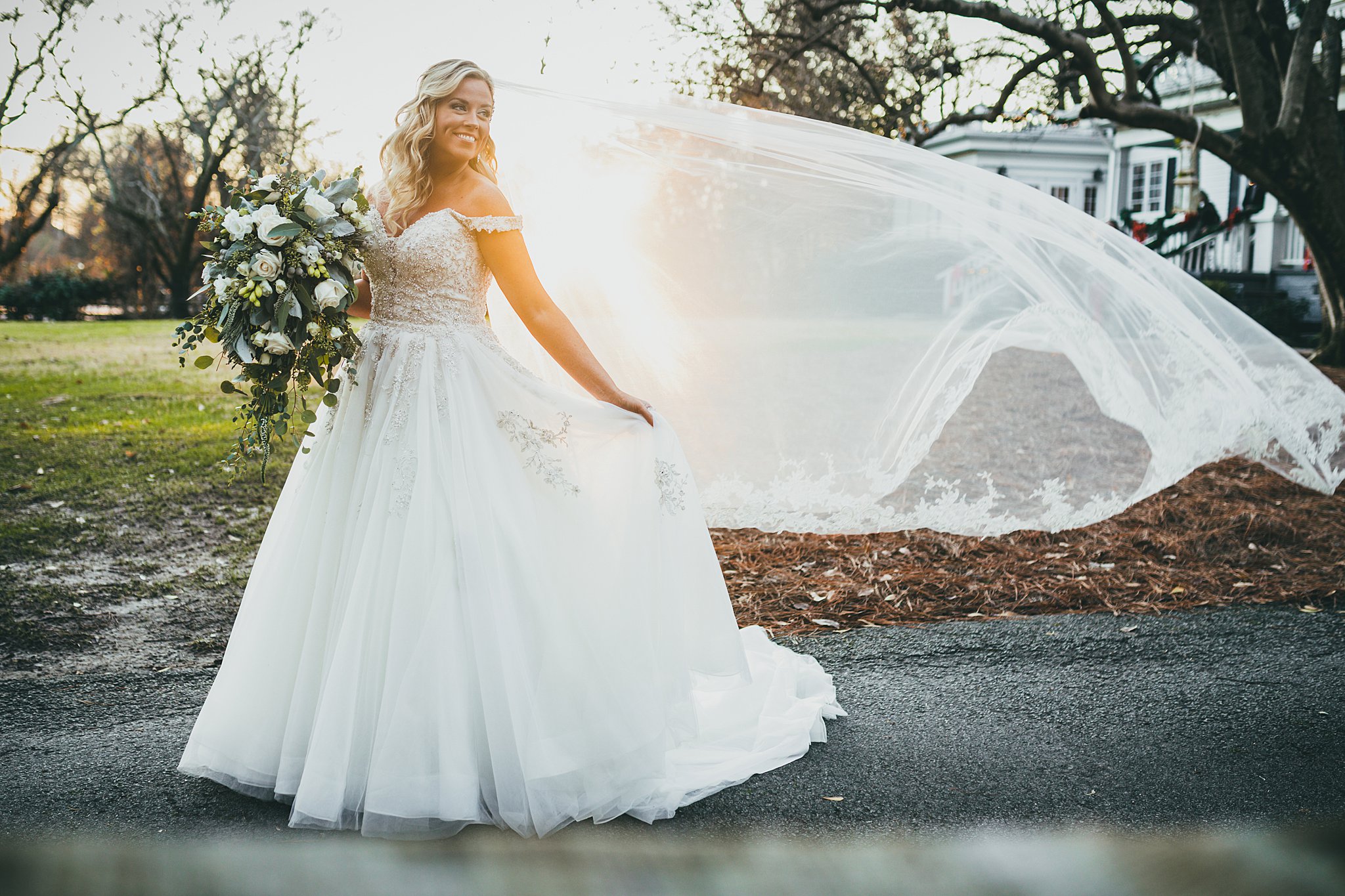 Atlanta Wedding Photographer, Bride, veil, sunset, wind Love & Story Weddings 