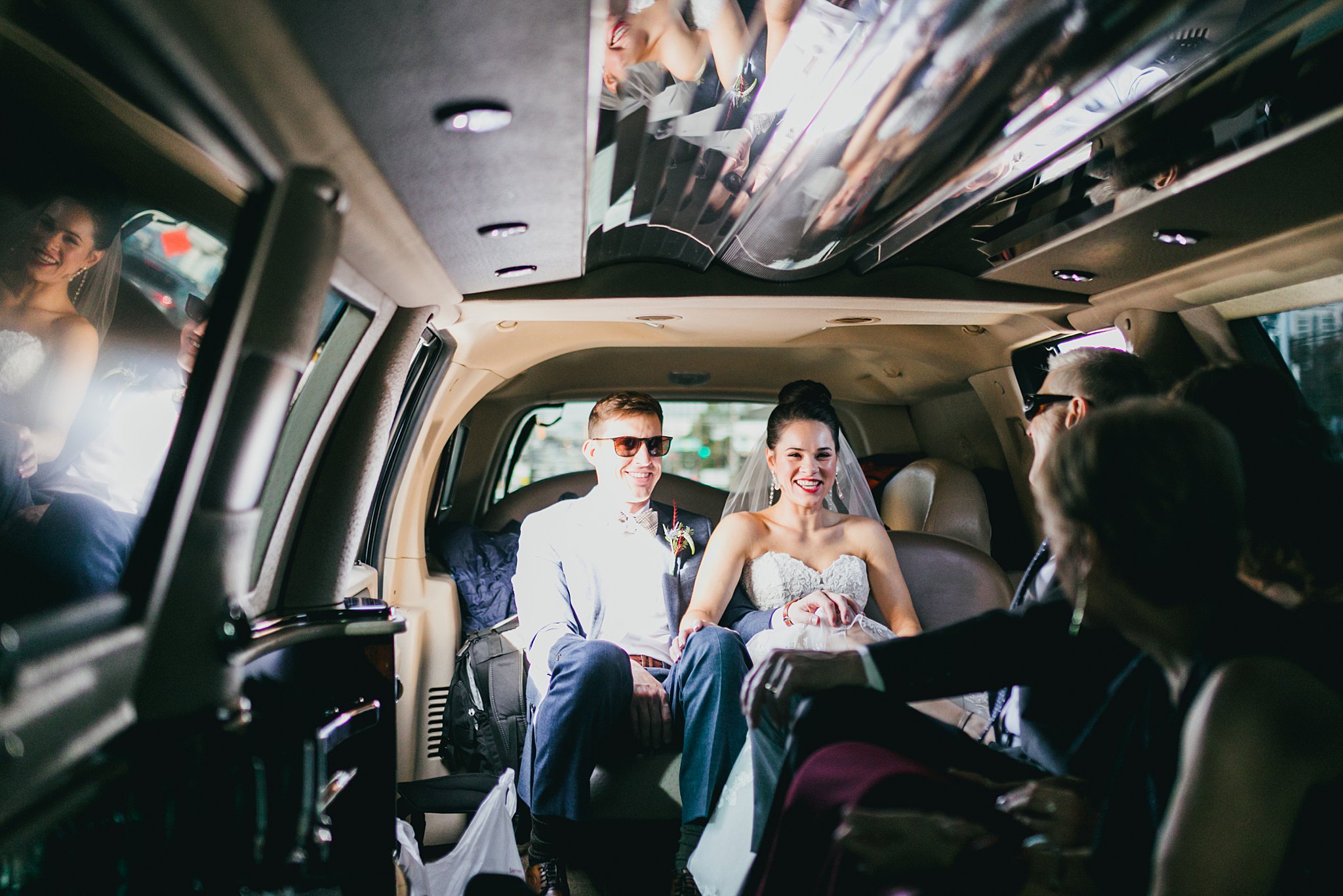 Atlanta Wedding Photographers Love & Story Bride and Groom in Limo